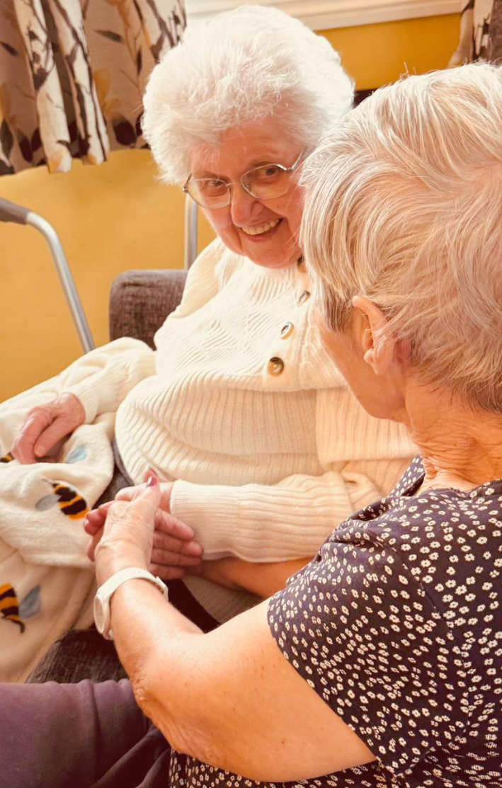 Resident at Care Home in Evesham Residents chatting together at care home in Evesham